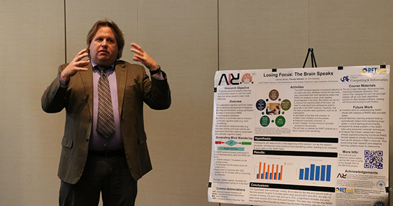 Damian Baraty, a returning REThink participant and Instructor of Computer Science at The Hill School, presents during the 2018 research showcase on August 2.